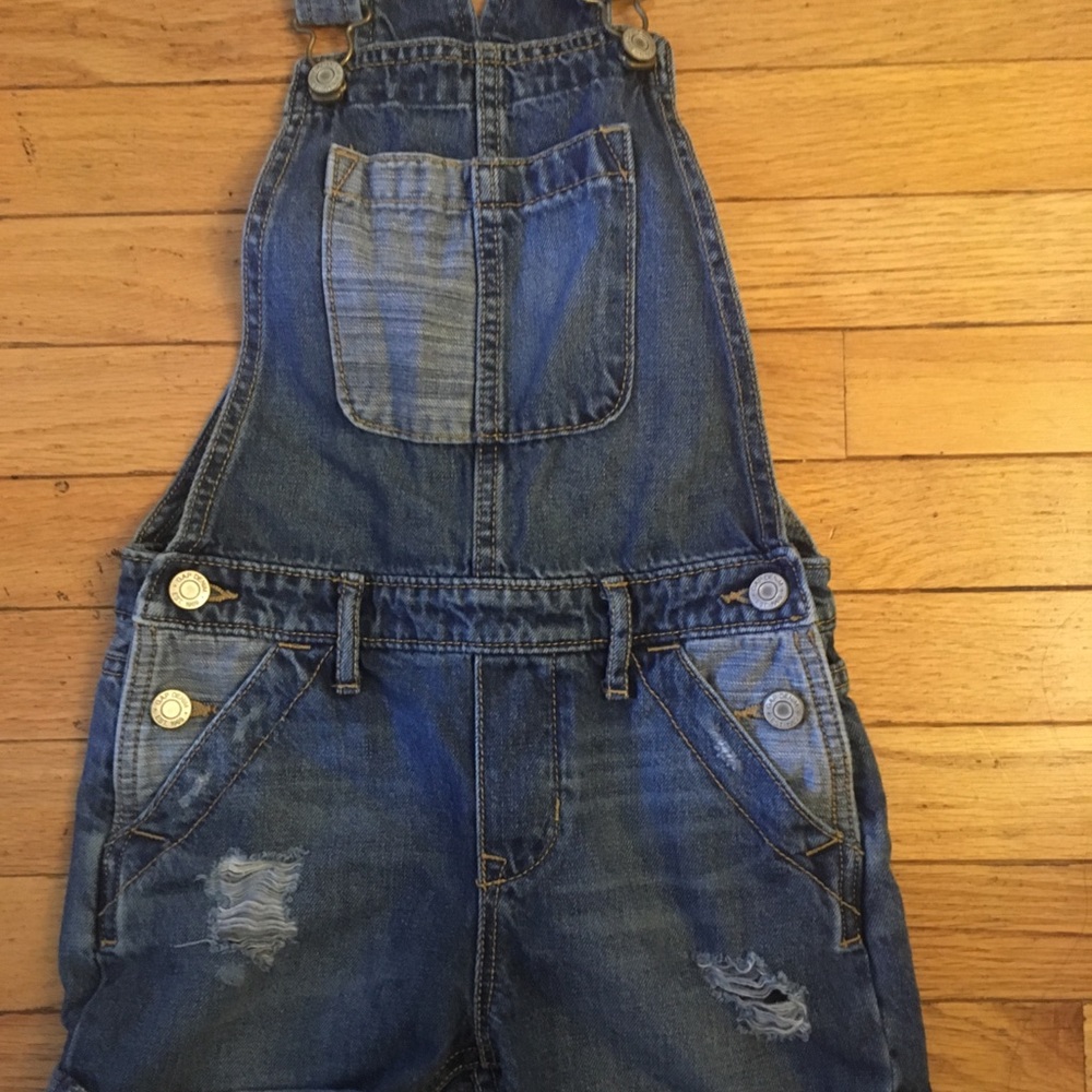 Kids Gap denim overalls.